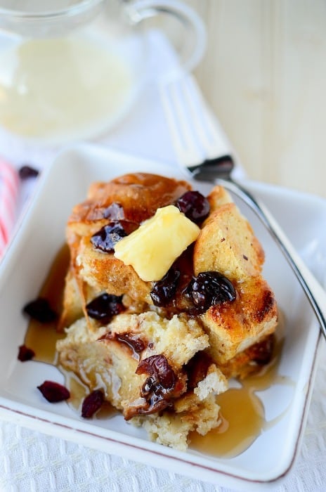 Crockpot Eggnog French toast on a white plate with a fork