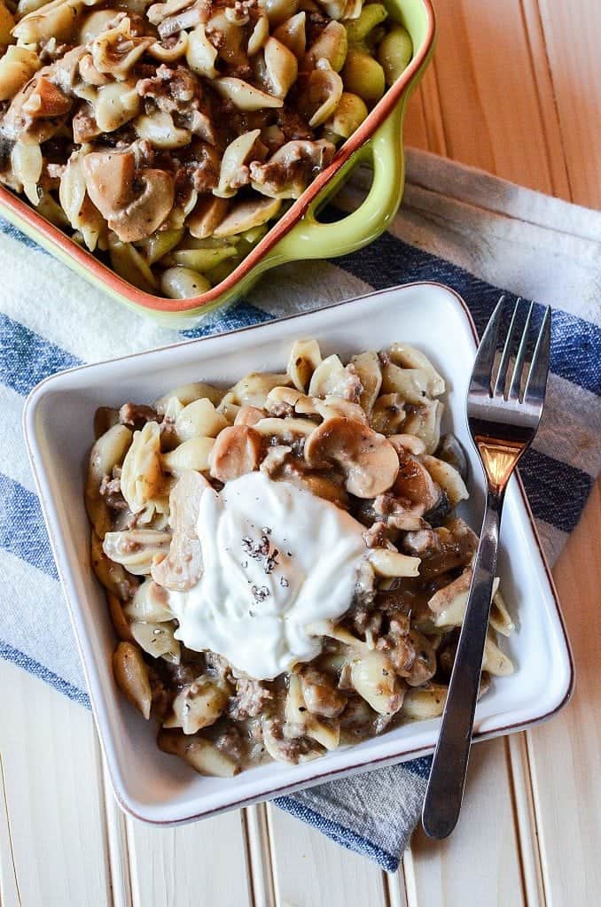 Crock Pot Mushroom Pasta Casserole Recipe with sour cream! This slow cooker crockpot casserole recipe is the perfect family dinners comfort food meal! Filled with beef and pasta your family will love it! 