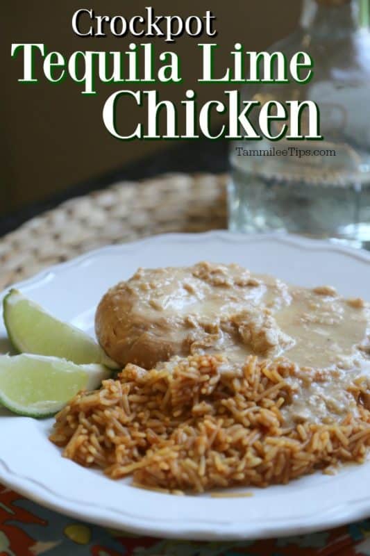 Crockpot Tequila Lime Chicken over a white plate with chicken, rice, and lime slices