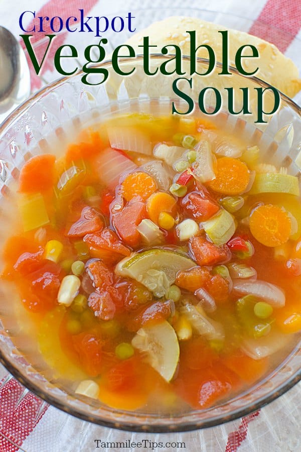 Crockpot vegetable soup text over a clear bowl filled with veggies and broth