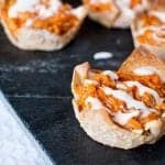 Buffalo Chicken Wonton Appetizer Recipe! This recipe uses crock pot buffalo chicken and ranch dressing! These appetizer bites are perfect for a football party, birthday party or any other parties you want a delicious appetizer recipes!