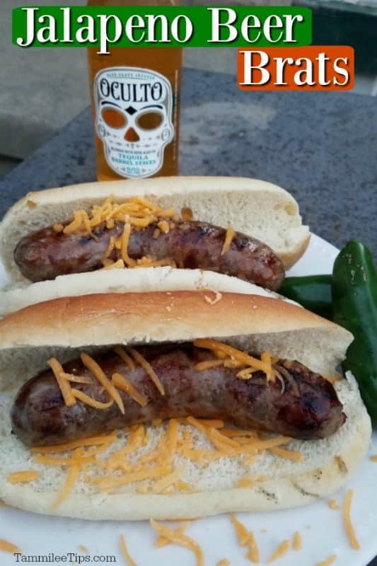 Jalapeno Beer Brats over a plate with two brats on buns, and a bottle of tequila barrel beer