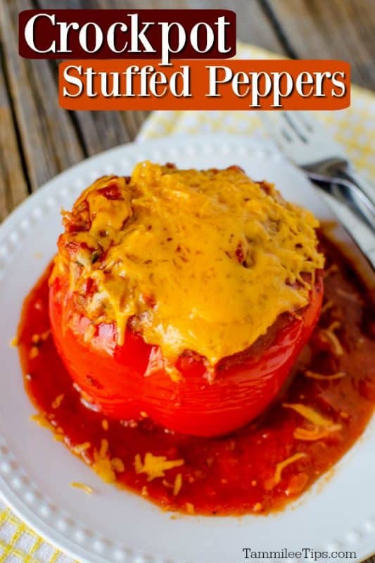 crockpot stuffed pepper on a white plate with a wood background