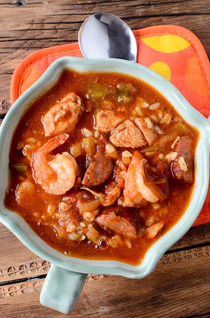 Super easy crock pot gumbo recipe the entire family will love! This cajun slow cooker recipe includes sausage, chicken and shrimp! Best crock pot recipe you will try! 
