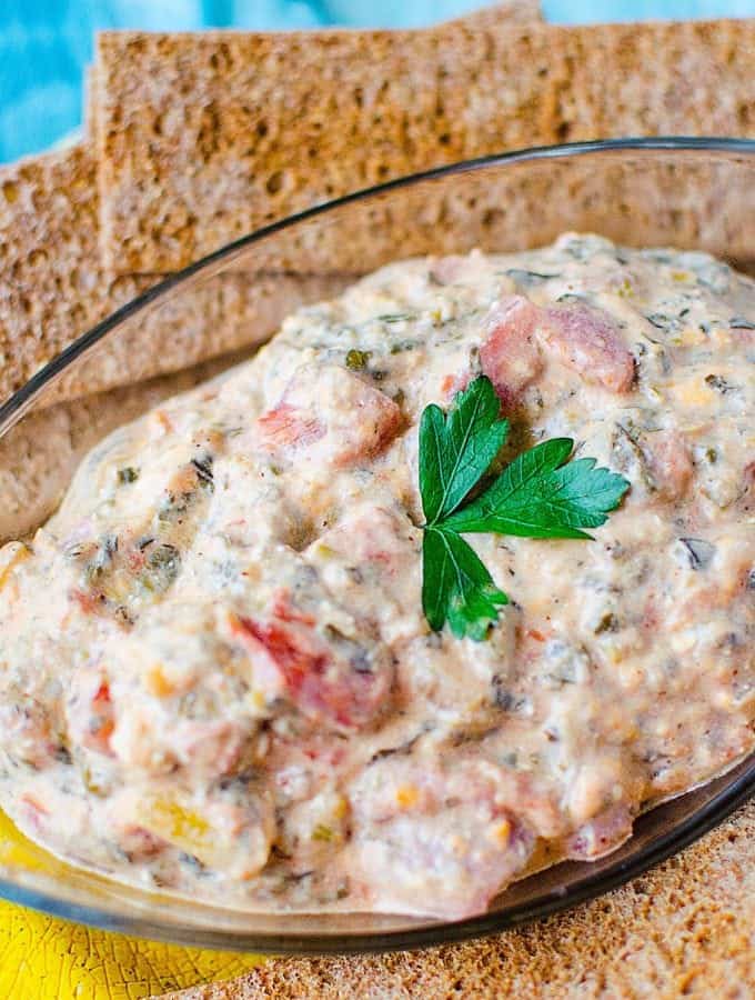 Crock Pot Mexican Spinach Dip is so easy to make! The slow cooker does all the work. Perfect for New Years, Super Bowl or any time you need a Crockpot Appetizer.