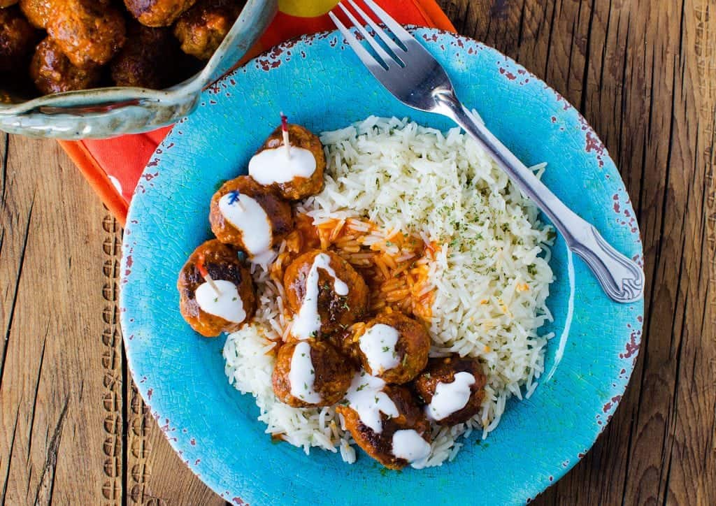 Simple Crock Pot Slow Cooker Buffalo Chicken Meatballs Recipe is perfect for your Super Bowl Football Parties or any day you need a good appetizer recipe. These crockpot meatballs are also great over rice for dinner.