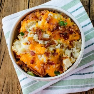 Easy Ultimate Loaded Slow Cooker Crock Pot Mashed Potatoes Recipe! The perfect comfort food for a crowd!