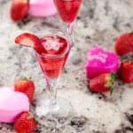 Easy to make Strawberry Rosé Champagne Wine Cocktail Recipe is perfect for Valentines Day, Girls night in, bunko night parties, and so much more!