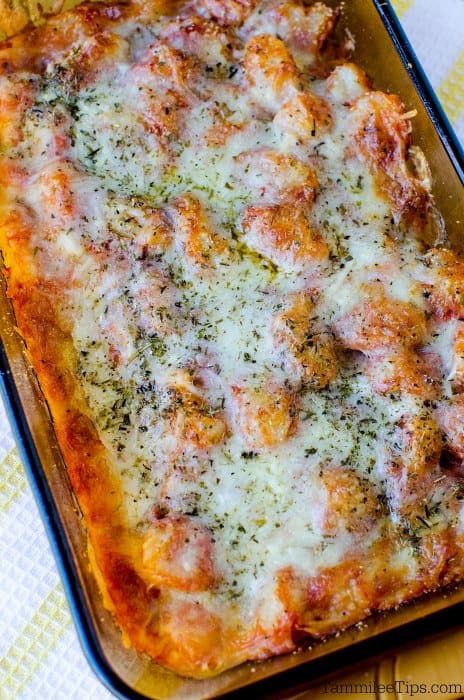 Gnocchi casserole in a glass baking dish on a napkin