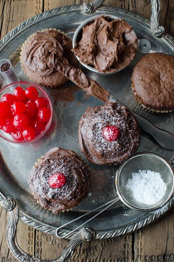 Easy Black Forest Cupcakes Recipe you will love! A delicious German treat that tastes so good! Made with cake mix, cherries and more! 