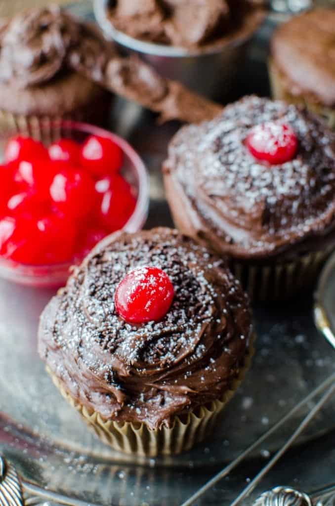 Easy Black Forest Cupcakes Recipe you will love! A delicious German treat that tastes so good! Made with cake mix, cherries and more! 