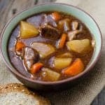 Slow Cooker Crock Pot Guinness Stew Recipe perfect for St. Patrick's Day meals! Perfect winter crockpot comfort food with beef and veggies.