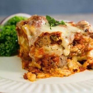 Easy Slow Cooker Crock Pot Lasagna Recipe the entire family will love. Ground beef, cheese, pasta combined to make the perfect Italian comfort food recipe.