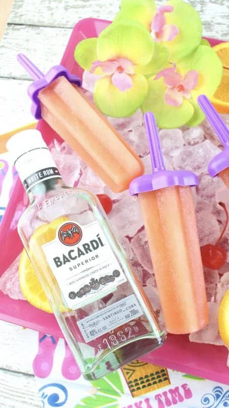 Bahama Mama Recipe for adult ice pops! The perfect cold treat on a hot summer day! Make a larger batch for summer parties, barbecues, tiki party, picnics and more! So easy to make
