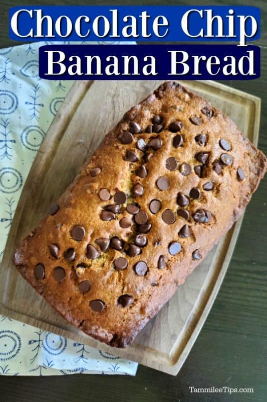 Chocolate Chip Banana Bread over a loaf of bread on a wooden cutting board next to a cloth napkin 