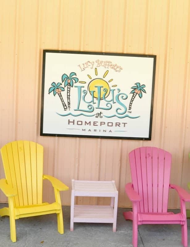 LuLu's at Homeport Marina sign above Adirondack chairs