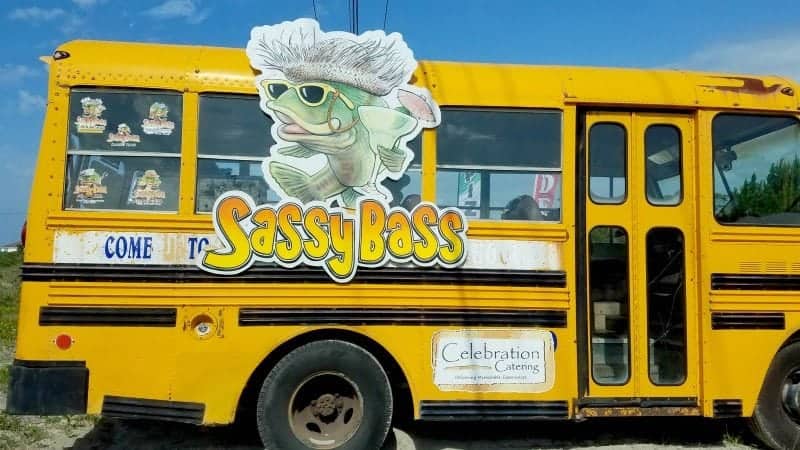 Sassy Bass sign on a yellow school bus