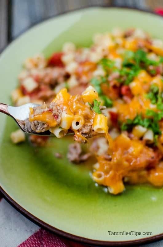 Cheeseburger Pasta on a fork over a green plate