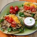 Easy Crock Pot Mexican Chicken Tostadas Recipe! The slow cooker crock pot does all the work and you get a great family dinner.