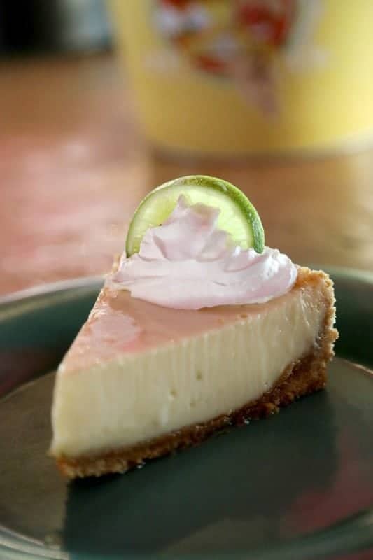 Slice of key lime pie on a green plate