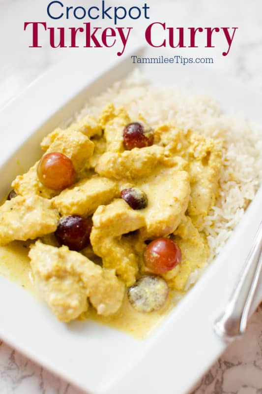 Crockpot Turkey Curry over a white plate with turkey curry and rice