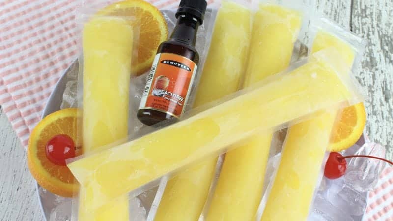 Fuzzy Navel Popsicles on a platter 