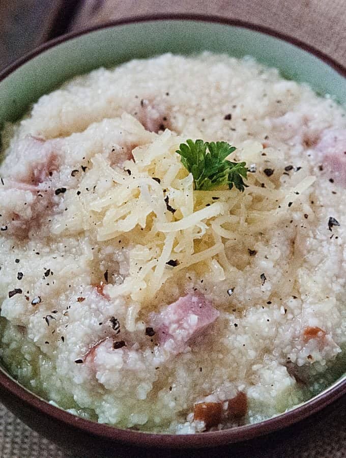 Easy Crock Pot Cheese Grits Recipe with leftover ham! Great for breakfast or brunch. The slow cooker crockpot does all the work.