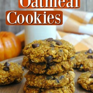 Pumpkin Oatmeal Cookies text printed over a stack of oatmeal pumpkin cookies on a cutting board