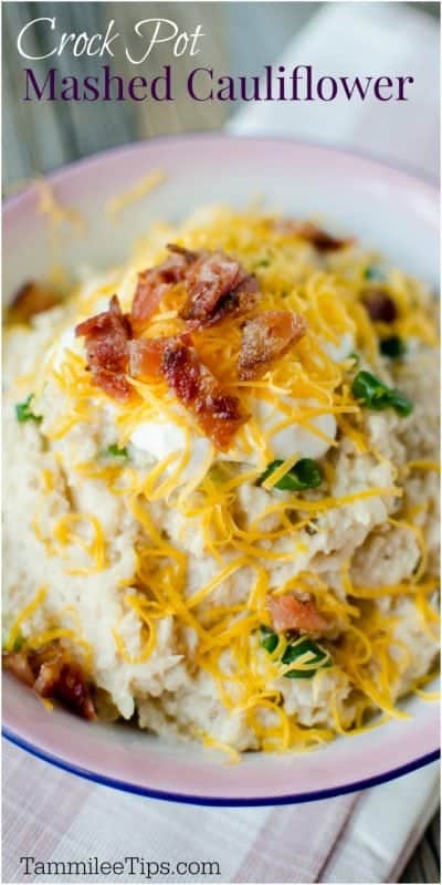 Crock Pot cheesy mashed cauliflower Recipe! This slow cooker recipe is good! Topped with bacon, cheese, green onions and more! #slowcooker #crockpot #recipe 