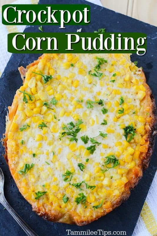 Crockpot Corn Pudding text written at the top of the photo with corn pudding on a slate background with a spoon