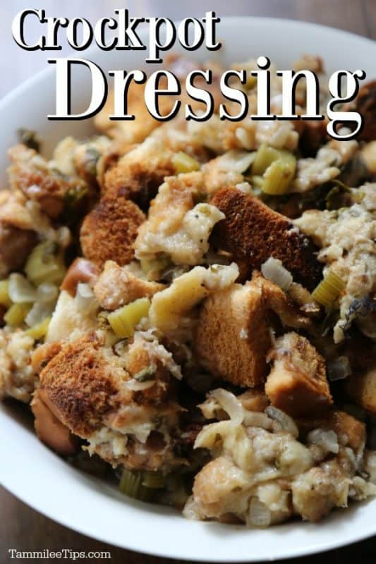 Crockpot Dressing over a white bowl filled with bread and stuffing 