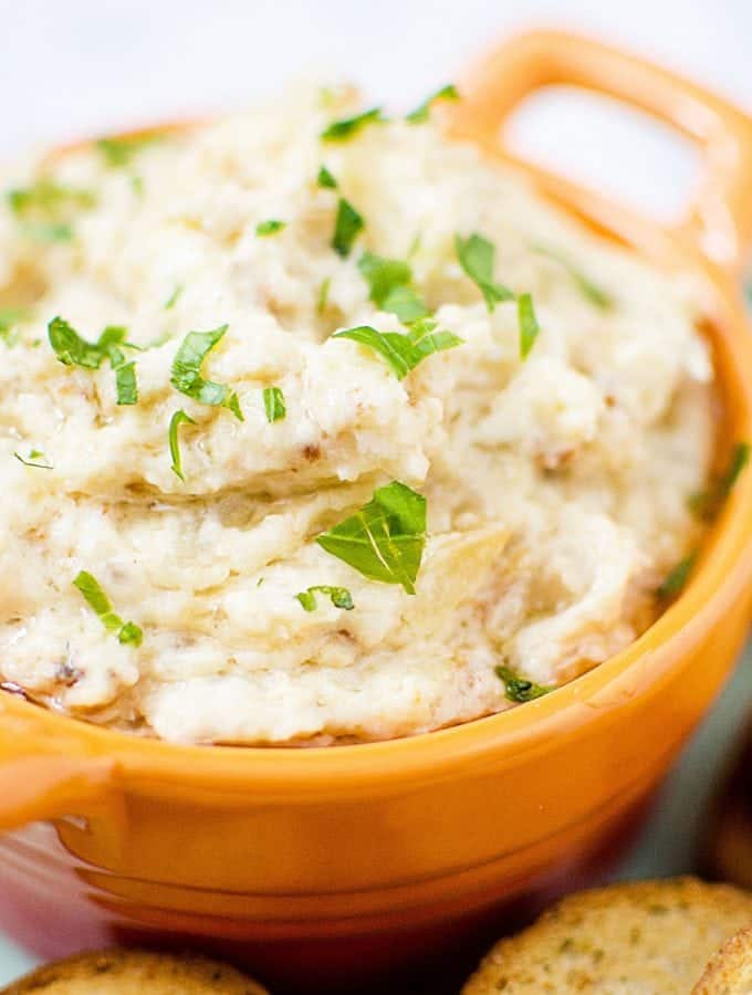Slow Cooker Crock Pot Hot Homemade Onion Dip Recipe perfect for holiday parties and family dinners. Super easy to make and tastes great. #crockpot #slowcooker #dip #appetizer #recipe #onion
