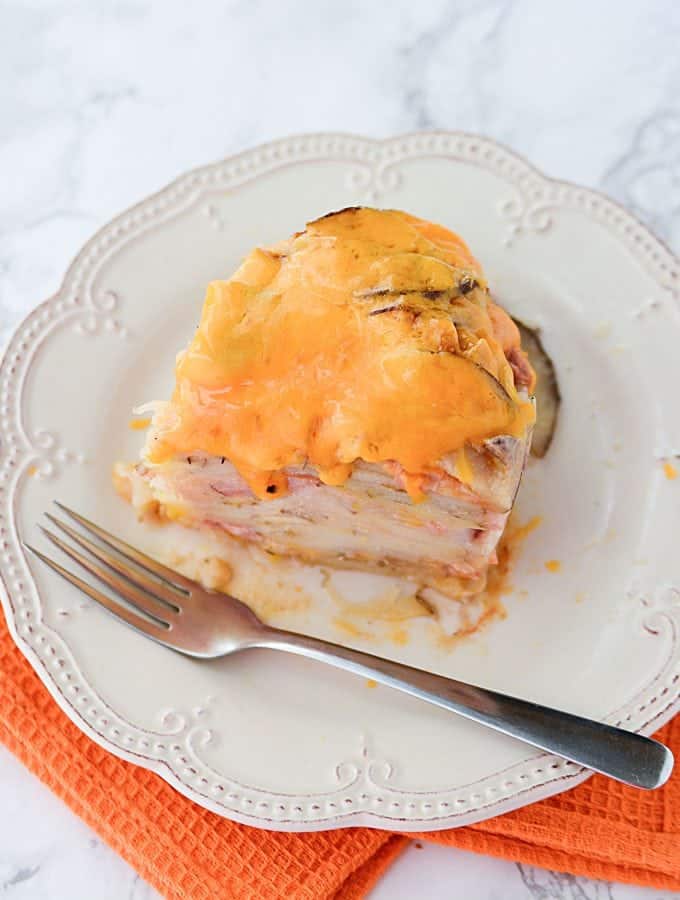 Slow Cooker Crock Pot Scalloped Potatoes and Ham Recipe! Great side dish that uses holiday leftovers and is easy to make. #Slowcooker #crockpot #potatoes #Ham #recipe #christmas #easter