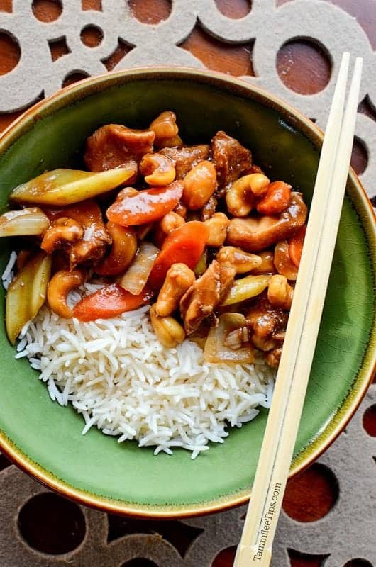 easy to make great slow cooker Cashew Chicken Recipe in a green bowl