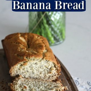 Homemade Banana Bread text over a loaf of moist banana bread with daffodils in a vase in the background