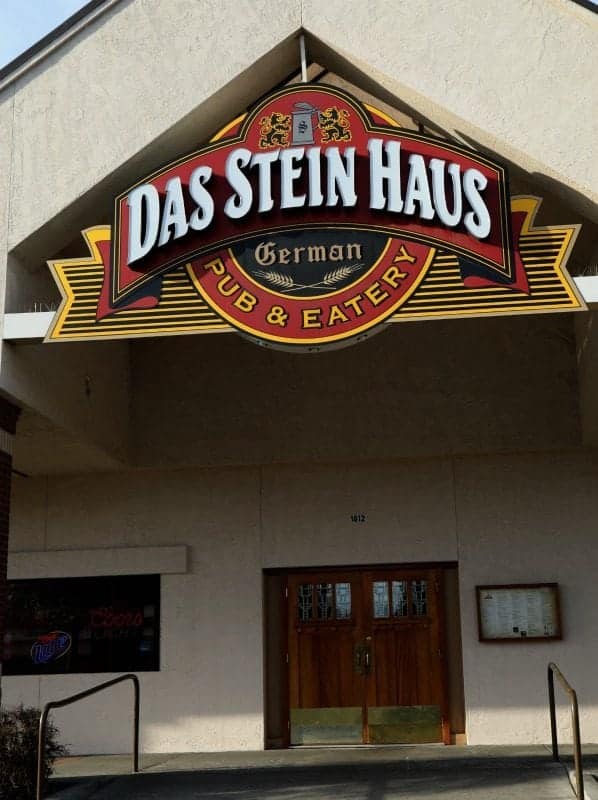 Das Stein Haus German Pub & Eatery sign over wooden doors