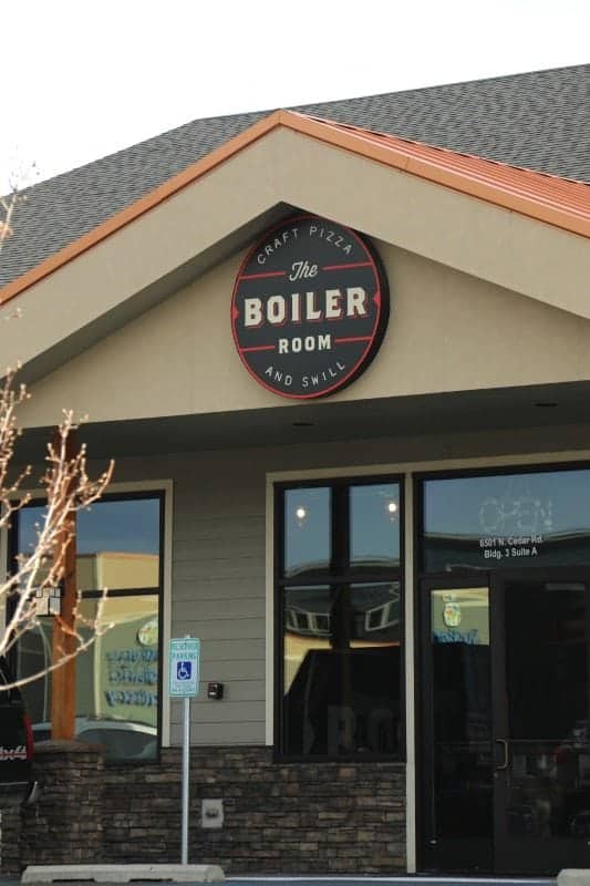 The Boiler Room circle sign over entrance doors