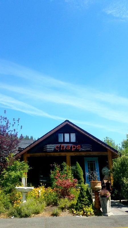 Exterior of Chaps with trees and bushes