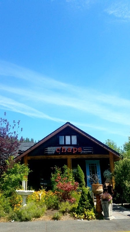 Exterior of Chaps with trees and bushes