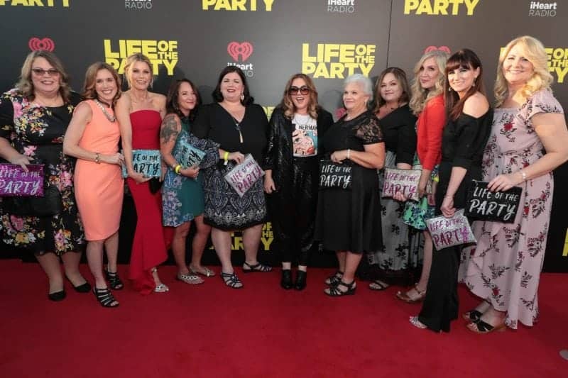 Group of women with Tammilee and Melissa McCarthy next to Life of the Party sign. 