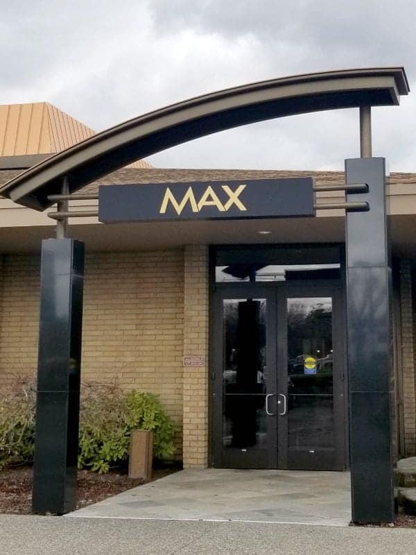 Max sign over a walkway to two doors