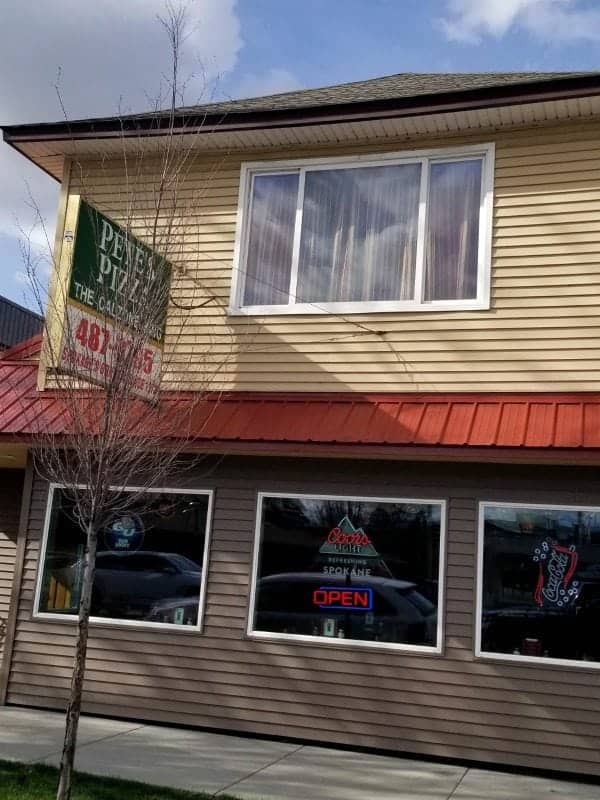 Pete's Pizza exterior with neon lights 