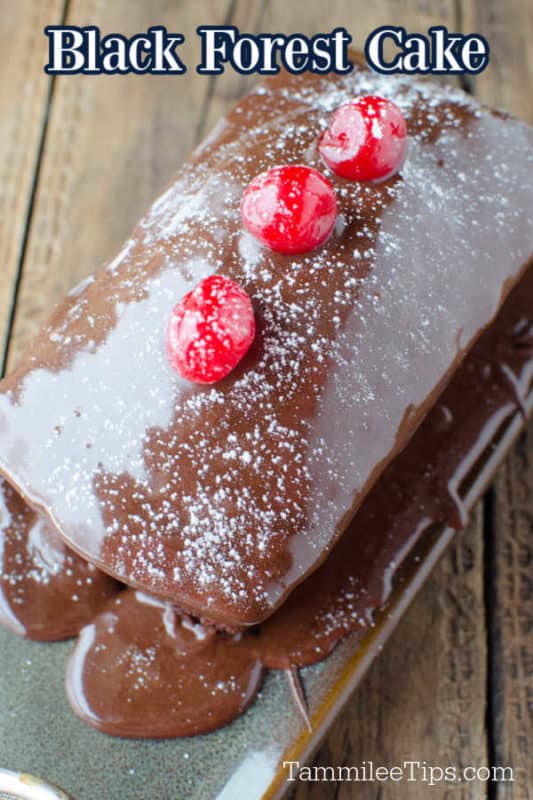 Black Forest Cake text over a mini cake with cherries on top