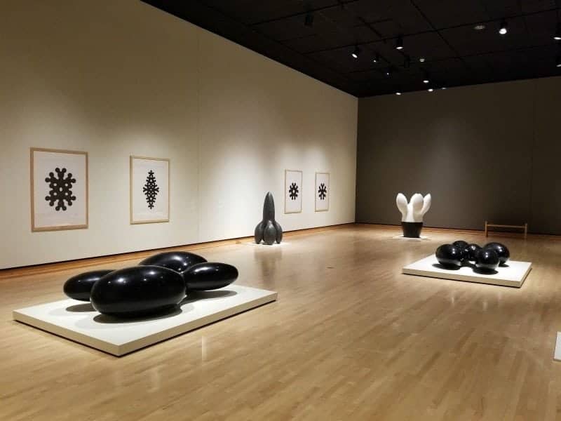 black and white sculptures in an art gallery