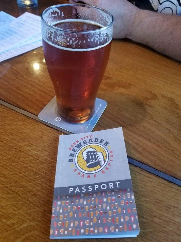 brewsader passport next to a beer