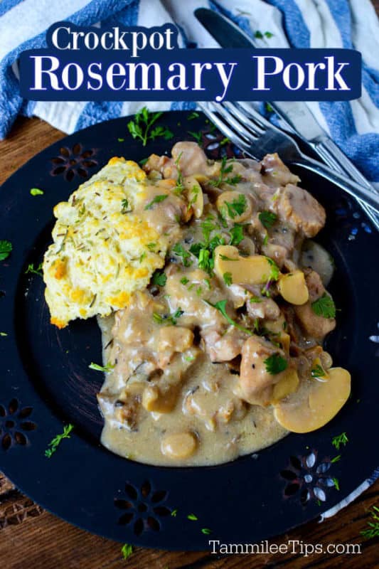 Crockpot Rosemary Pork on a blue plate with a fork and knife