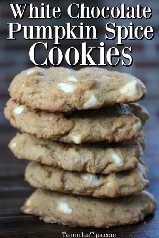 White Chocolate Pumpkin Spice Cookies over a stack of cookies on a dark board