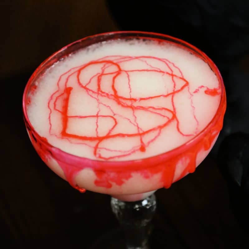 bloody colada cocktail in a margarita glass