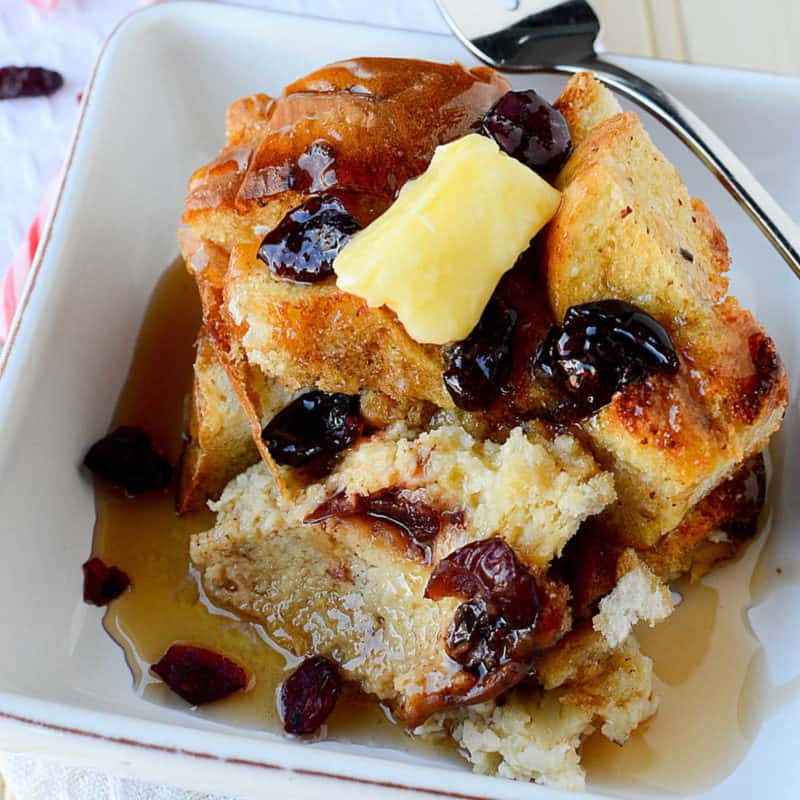 Crockpot Eggnog French toast on a white plate with a fork