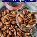 crockpot sweet and spicy nuts on a silver plate with a glass dish in the middle filled with nuts